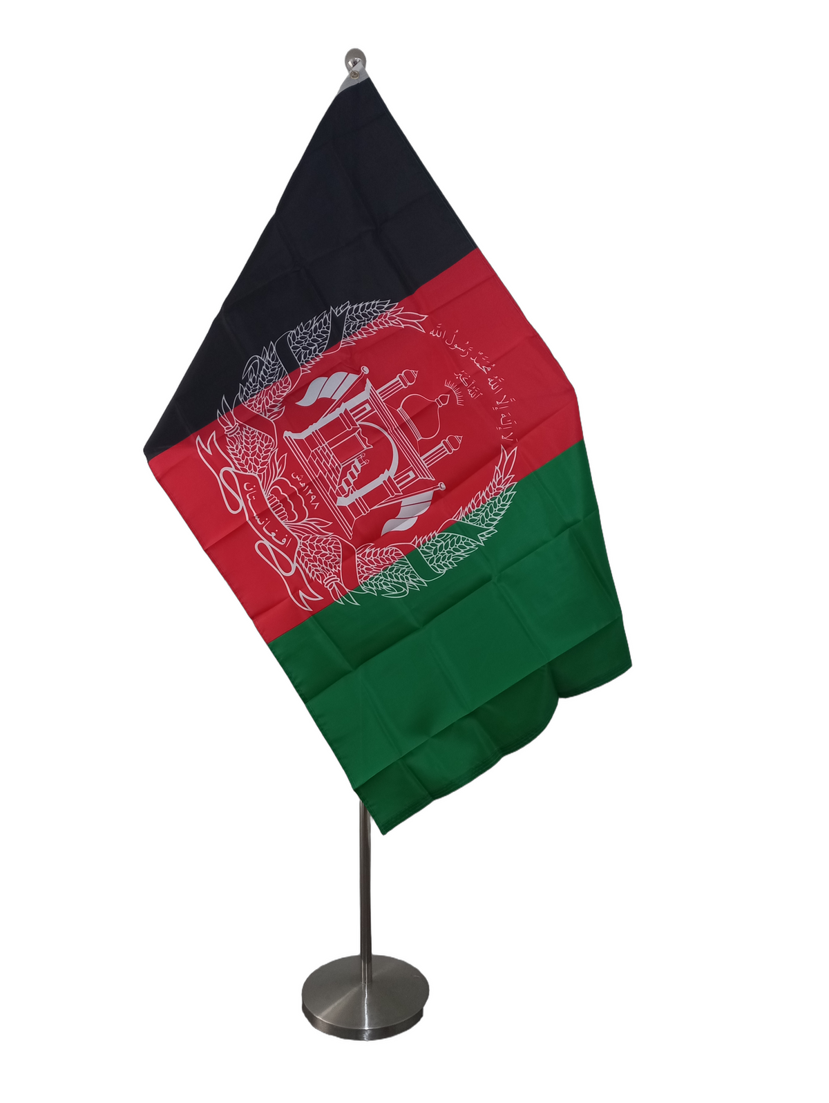The flag of Afghanistan, featuring horizontal stripes in black, red, and green colors with a white crescent and star on the top stripe. On a ceremonial pole.