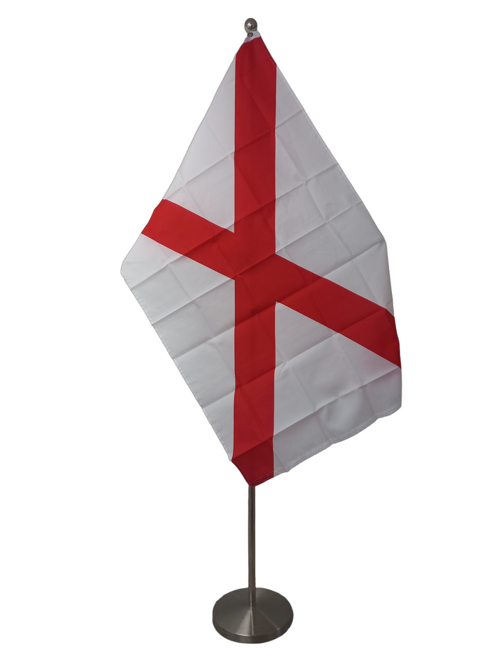 Flag of Alabama with a white background and a red cross. Diagonal division. On a ceremonial pole