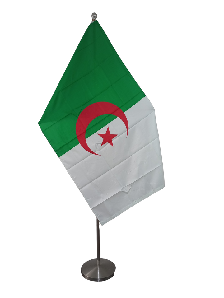 Flag of Algeria, green and white vertical strips with a red Islamic crescent moon and star. Fitted with metal eyelets. On a ceremonial pole.