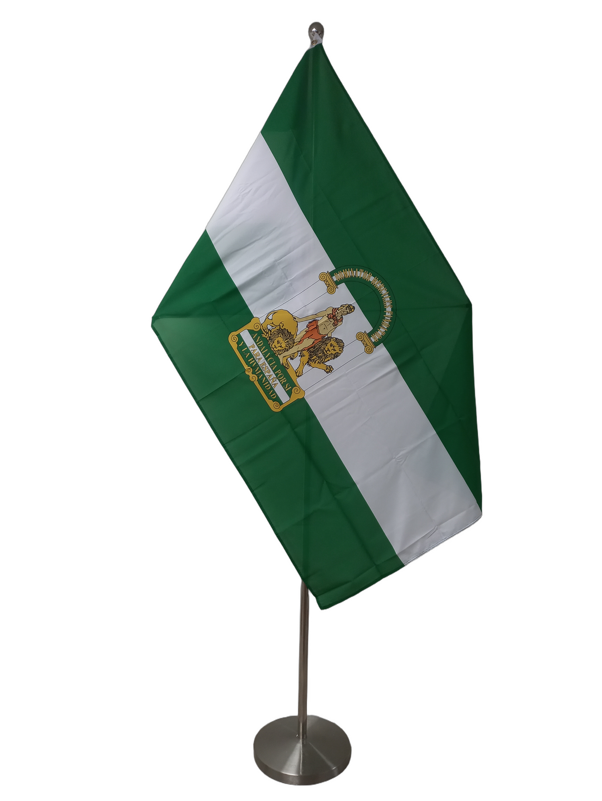 A flag of Andalusia, Spain, featuring a green background with a white and green emblem in the center and two metal grommets. On a ceremonial pole.
