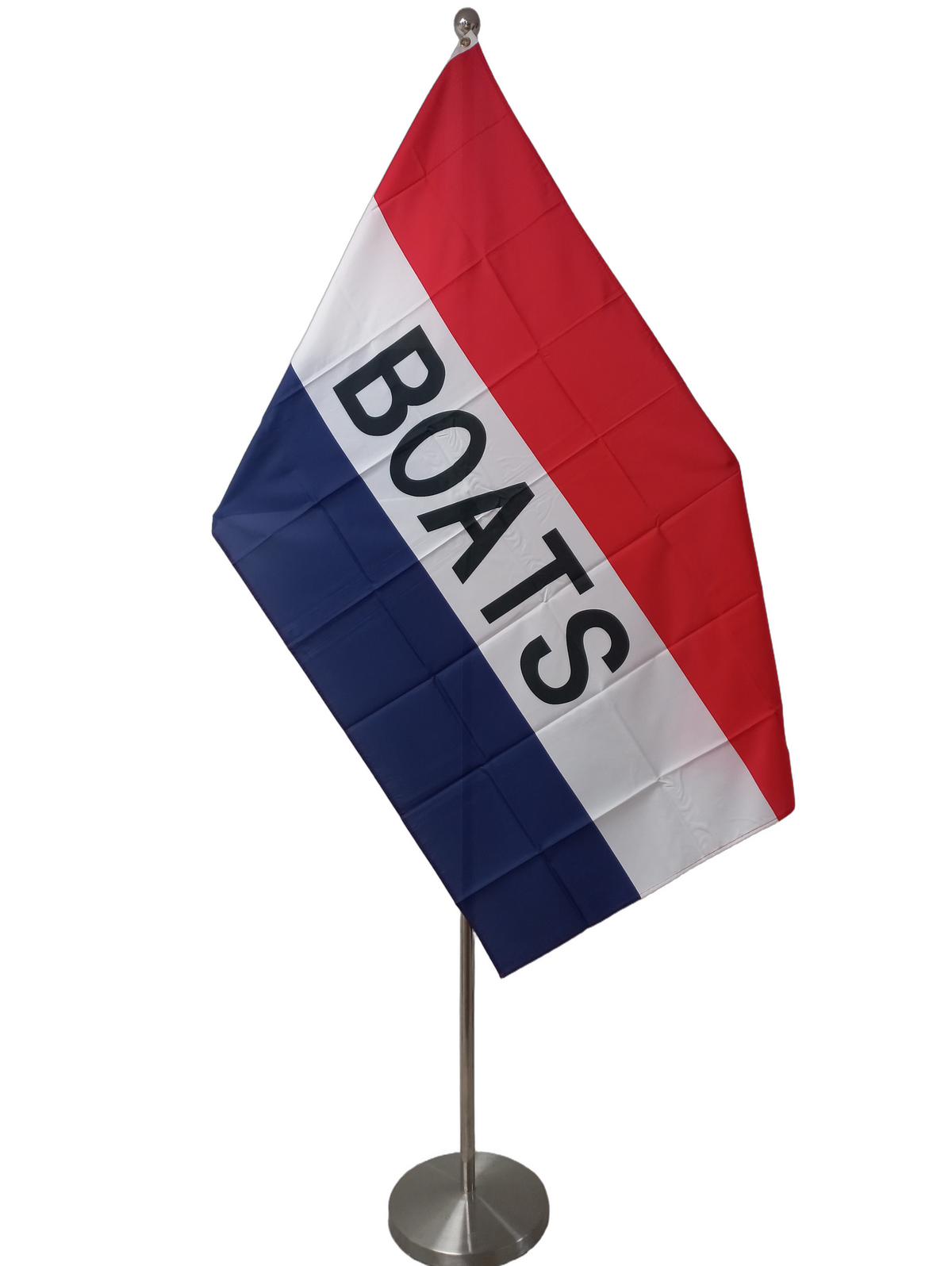 Red white and blue horizontal striped flag with BOATS written on it. On a ceremonial flag pole.