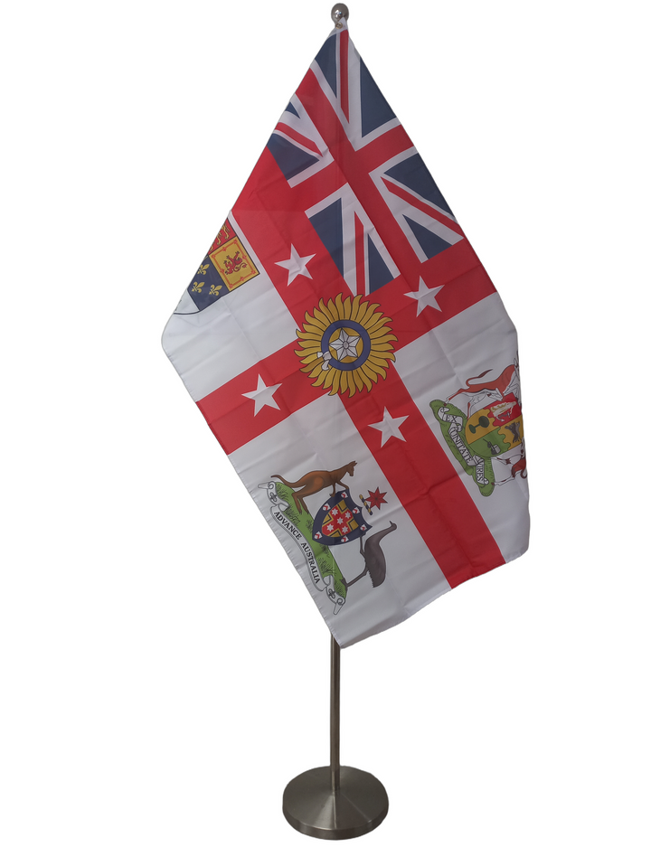 A flag featuring the Union Jack with additional emblematic elements representing the British Empire, including representations from South Africa, Canada, and Australia. On a ceremonial flag pole.