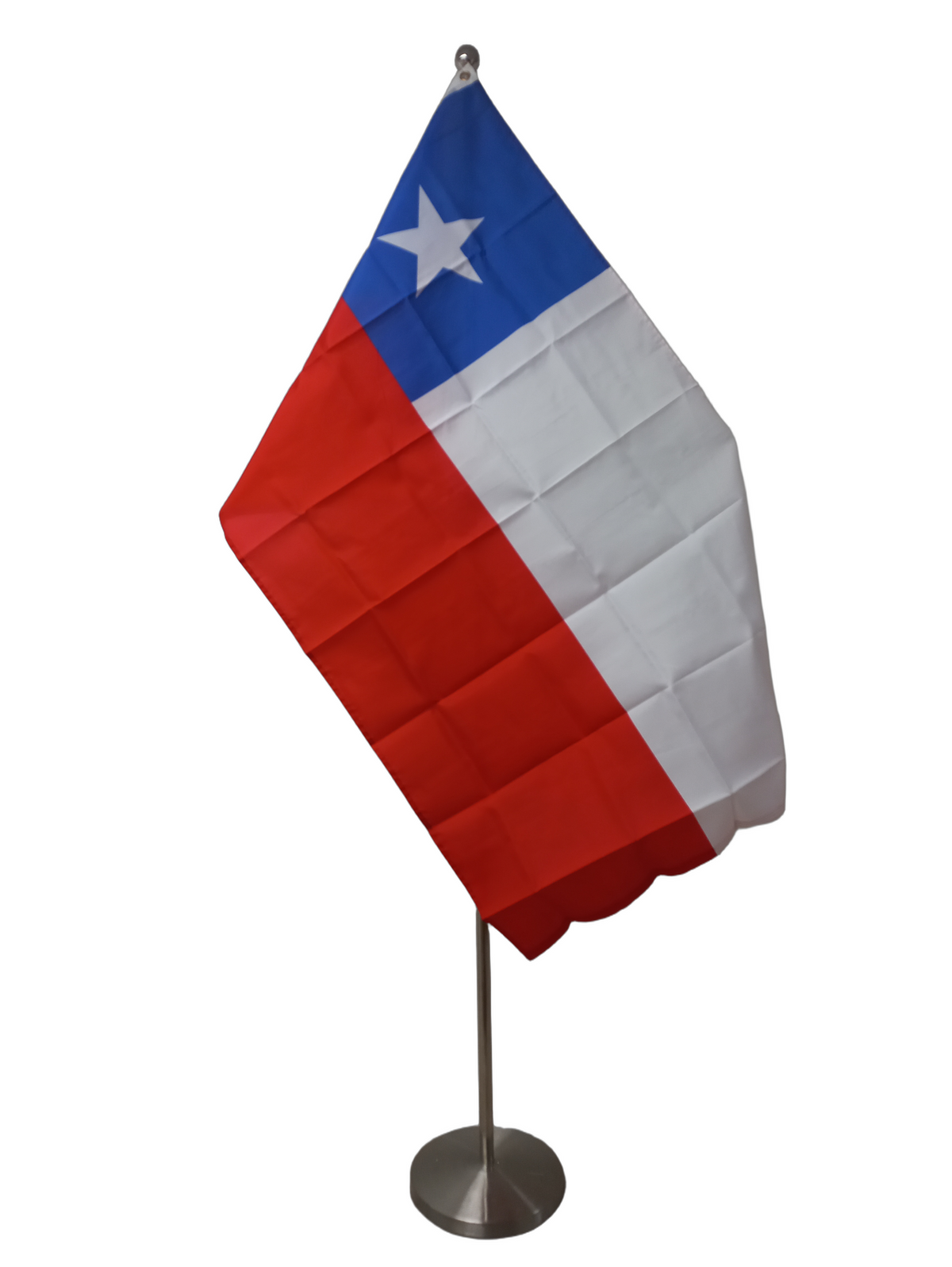 Flag of Chile with horizontal stripes of white and red, featuring a white star on a blue square in the top left corner, with two metal grommets for flying. On a ceremonial flag pole.