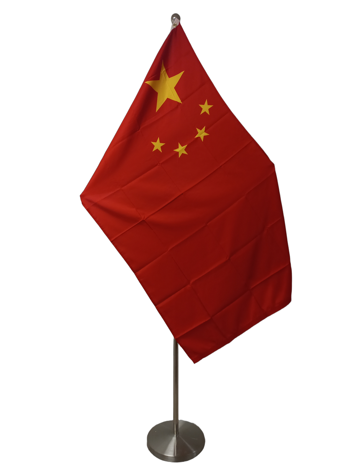 Flag of China, with a red background and a large yellow star in the corner, along with four smaller yellow stars forming a pattern. On a ceremonial flag pole.
