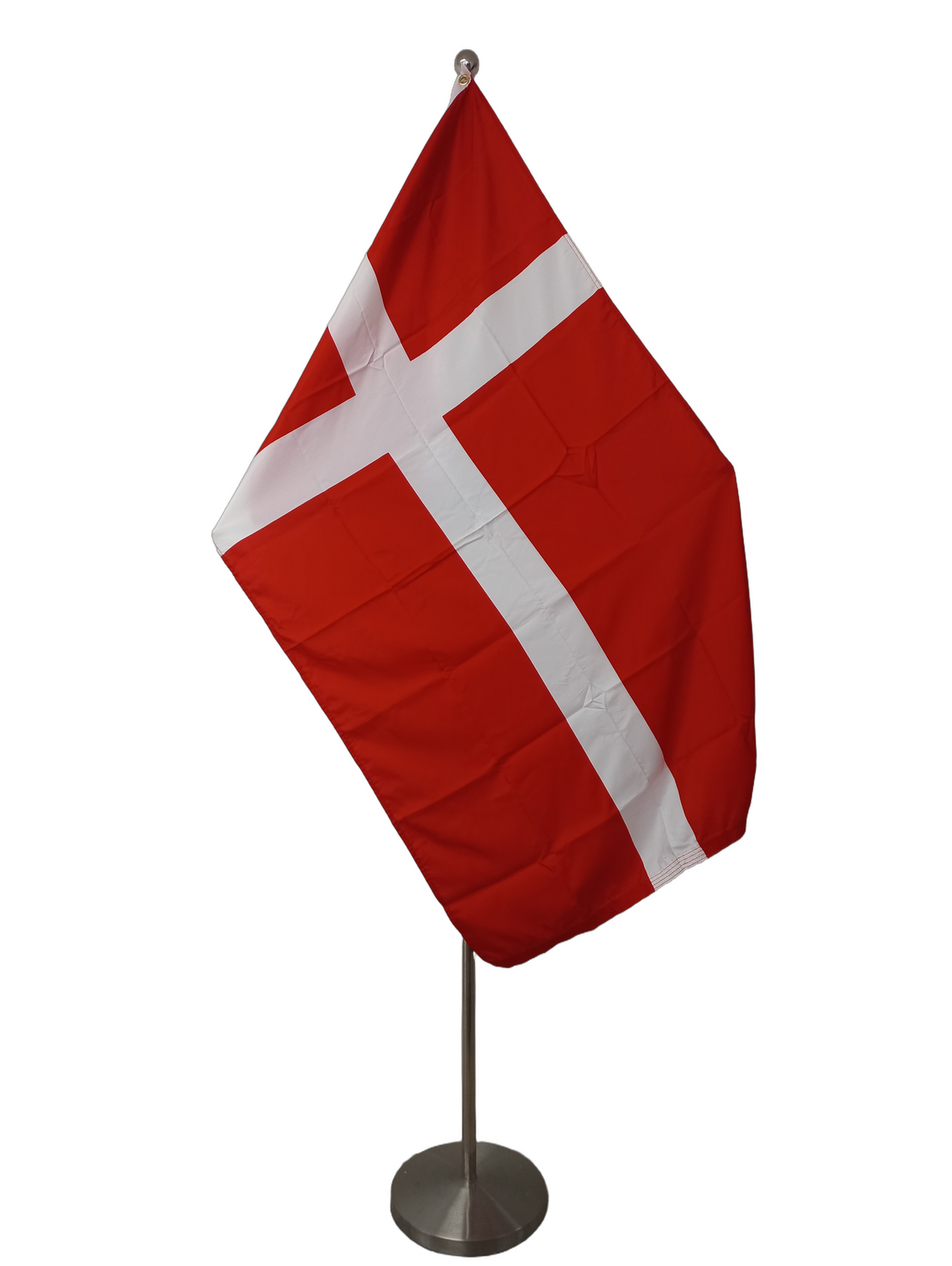 Flag of Denmark, featuring a red background and white cross design, with two metal grommets for flying. On a ceremonial flag pole.