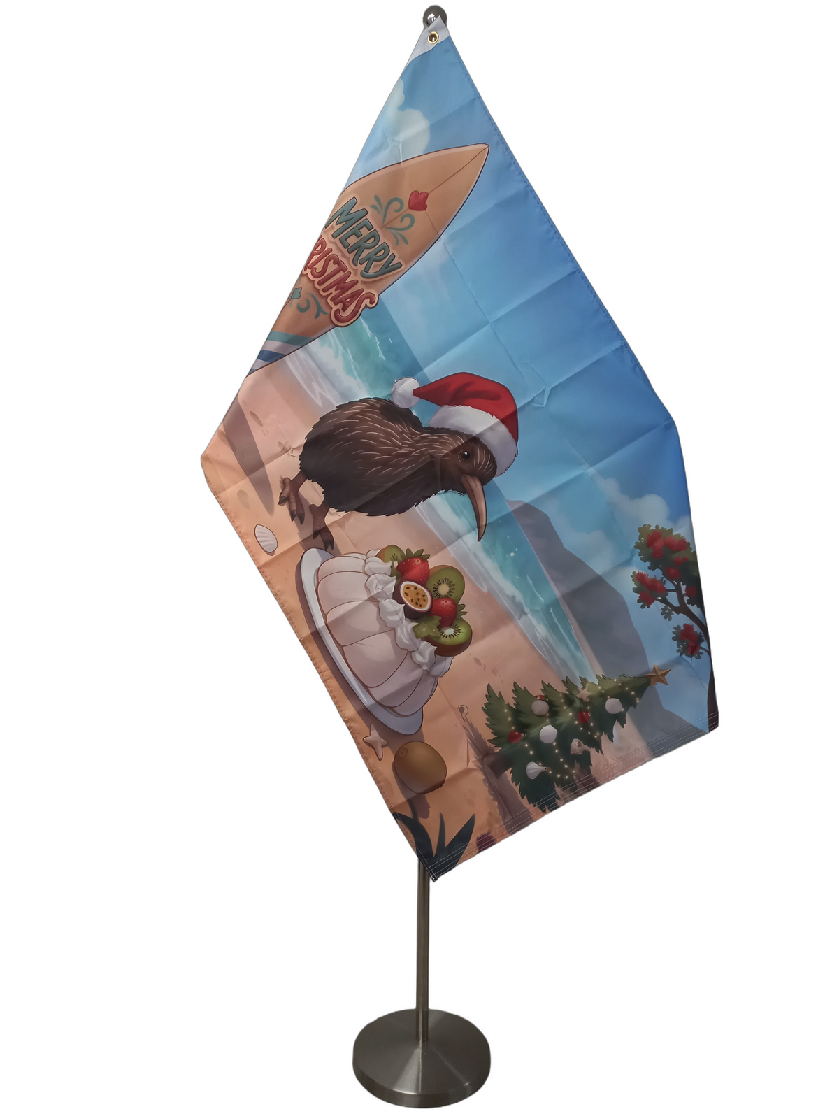 Cartoon kiwi bird wearing a Santa hat on a beach with Christmas decorations. On a ceremonial flag pole.
